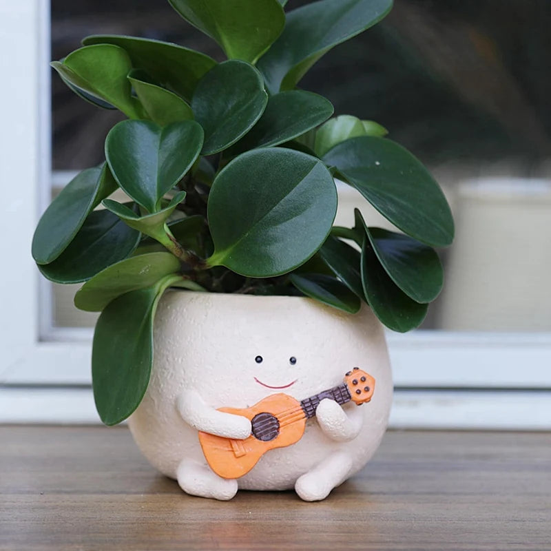 Maceta con forma de cara sonriente y orificio de drenaje, de resina, ideal para colocar en hileras de plantas, con forma de guitarra, para suculentas de interior.