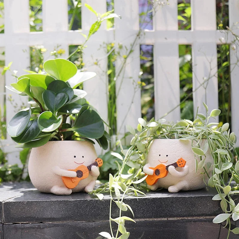 Maceta con forma de cara sonriente y orificio de drenaje, de resina, ideal para colocar en hileras de plantas, con forma de guitarra, para suculentas de interior.